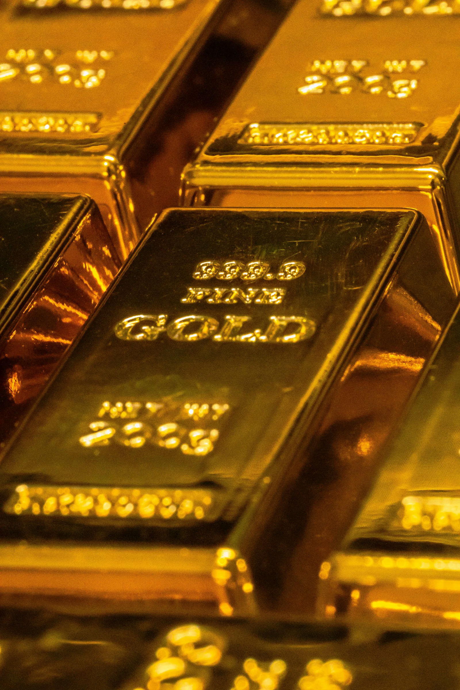 The stamped face of a 999.9 fine gold bar